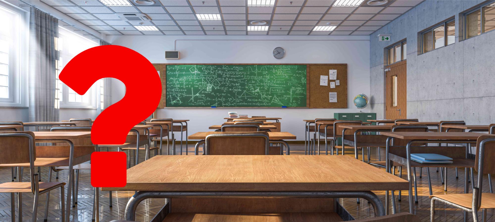 Ett rött frågetecken till vänster om ett klassrum.